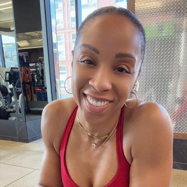 Dr. Shari smiling in the gym